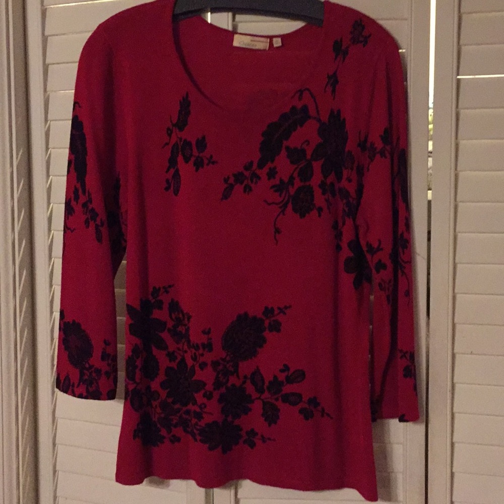 Black and red sweater.